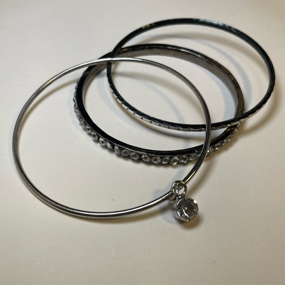 Three Elegant Silver Tone and Crystal Bangle Stacking Bracelets - Picture 4 of 6